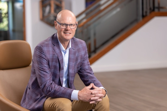 smiling person in professional attire